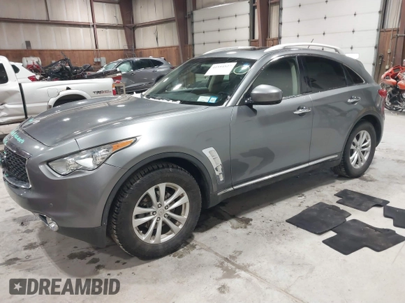 2017 Infiniti QX70 z VIN JN8CS1MU3HM143799, wystawiony jako IAAI lot #41554527 z przebiegiem 70 453 mil mil oraz . Historia ofert i sprzedaży dostępna na DreamBid. Obrazek 17.