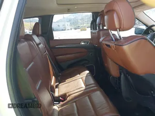 2016 Jeep Grand Cherokee with VIN 1C4RJEJM8GC321506, listed as a IAAI auction lot 41969587 with 226,072 mi miles and . Bid and sale history available at DreamBid. Image 8.