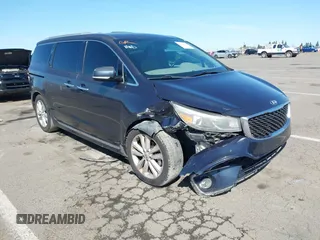 2016 Kia Sedona SX-L with VIN KNDME5C15G6083811, listed as a IAAI auction lot 41932863 with 124,218 mi miles. Bid and sale history available at carsss.com. Image 1.