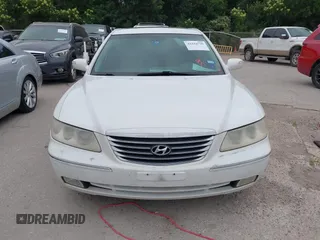 2009 Hyundai Azera Limited z VIN KMHFC46F39A358569, wystawiony jako IAAI lot #42294790 z przebiegiem 118 366 mil mil oraz . Historia ofert i sprzedaży dostępna na DreamBid. Obrazek 6.