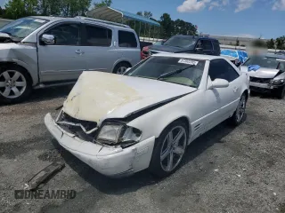1999 Mercedes-Benz SL 500 with VIN WDBFA68F3XF176873, listed as a Copart auction lot 57392295 with Not provided miles and Salvage title. Bid and sale history available at DreamBid. Image 1.