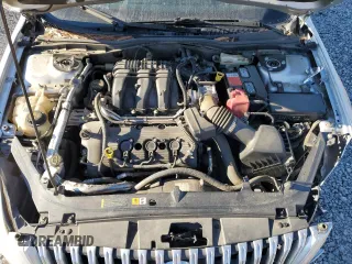 2011 Mercury Milan Premier z VIN 3MEHM0JG5BR605118, wystawiony jako Copart lot #81288794 z przebiegiem 135 250 mil mil oraz Szkody całkowita. Historia ofert i sprzedaży dostępna na DreamBid. Obrazek 11.