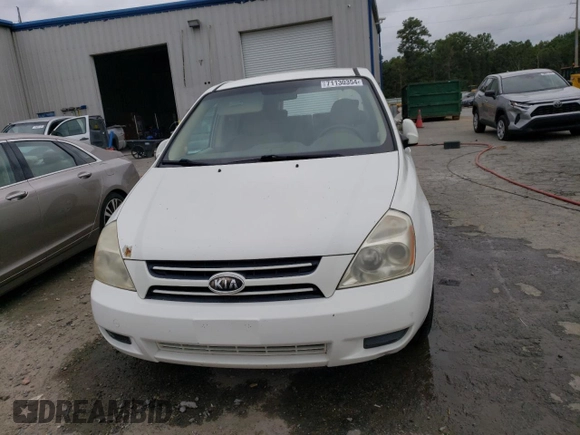 2006 Kia Sedona LX with VIN KNDMB233466022537, listed as a Copart auction lot 71130354 with 215,997 mi miles and Salvage Title. Bid and sale history available at carsss.com. Image 5.