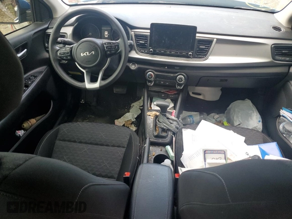 2023 Kia Rio S with VIN 3KPA24AD6PE548027, listed as a Copart auction lot 63697104 with 34,588 mi miles and Salvage Title. Bid and sale history available at carsss.com. Image 8.