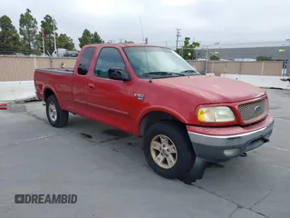 2002 Ford F-150 XL z VIN 1FTRX18W92KE21921, wystawiony jako IAAI lot #42488433 z przebiegiem 151 746 mil mil oraz . Historia ofert i sprzedaży dostępna na DreamBid. Obrazek 1.
