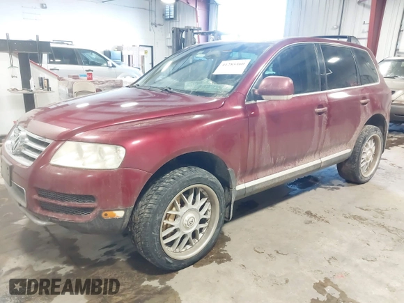 2004 Volkswagen Touareg z VIN WVGCM67LX4D038012, wystawiony jako IAAI lot #41285460 z przebiegiem Nie podano mil oraz . Historia ofert i sprzedaży dostępna na DreamBid. Obrazek 17.