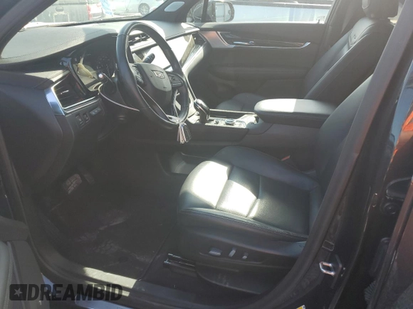 2021 Cadillac XT6 Premium Luxury with VIN 1GYKPCRS1MZ199288, listed as a Copart auction lot 54264995 with 51,432 mi miles and Salvage Title. Bid and sale history available at carsss.com. Image 7.