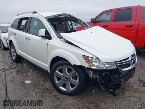 2012 Dodge Journey Crew with VIN 3C4PDCDG7CT165224, listed as a IAAI auction lot 41568580 with 140,211 mi miles and . Bid and sale history available at DreamBid. Image 1.
