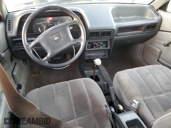 1988 Ford Escort z VIN 1FAPP959XJW370611, wystawiony jako Copart lot #86715994 z przebiegiem 3424 mil mil oraz Tytuł czysty. Historia ofert i sprzedaży dostępna na DreamBid. Obrazek 8.