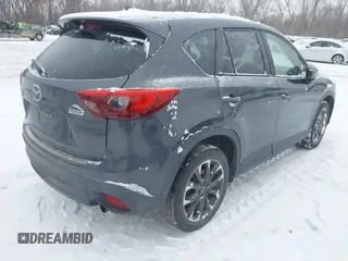 2016 Mazda CX-5 Grand Touring with VIN JM3KE4DY2G0913412, listed as a IAAI auction lot 41616132 with 85,166 mi miles. Bid and sale history available at carsss.com. Image 4.