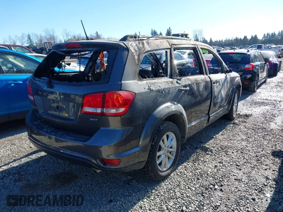 2015 Dodge Journey SXT with VIN 3C4PDDBG3FT755577, listed as a IAAI auction lot 41560150 with Not Provided miles and . Bid and sale history available at DreamBid. Image 4.