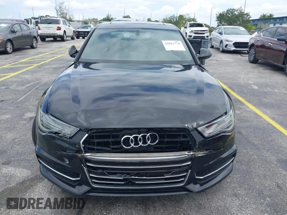2016 Audi A6 2.0T Premium Plus with VIN WAUGFAFC6GN055826, listed as a IAAI auction lot 42011778 with 98,210 mi miles. Bid and sale history available at carsss.com. Image 6.