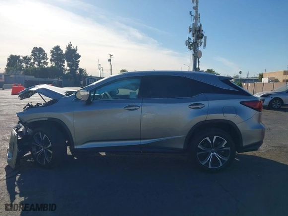 2022 Lexus RX with VIN 2T2HZMAA7NC255857, listed as a IAAI auction lot 41396704 with 27,631 mi miles. Bid and sale history available at carsss.com. Image 13.