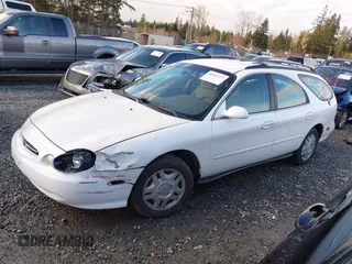 1999 Ford Taurus SE Standard with VIN 1FAFP58U5XG200924, listed as a IAAI auction lot 41501093 with 105,102 mi miles and . Bid and sale history available at DreamBid. Image 14.