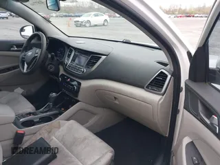 2018 Hyundai Tucson SE with VIN KM8J23A46JU625168, listed as a IAAI auction lot 41877146 with 152,572 mi miles. Bid and sale history available at carsss.com. Image 5.