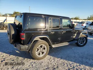 2019 Jeep Wrangler Unlimited Sahara with VIN 1C4HJXEG5KW570347, listed as a Copart auction lot 80388234 with 69,564 mi miles and Salvage Title. Bid and sale history available at carsss.com. Image 3.