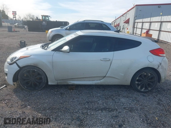 2013 Hyundai Veloster w/Gray Int with VIN KMHTC6AD4DU140121, listed as a IAAI auction lot 41410252 with 202,596 mi miles and . Bid and sale history available at DreamBid. Image 17.