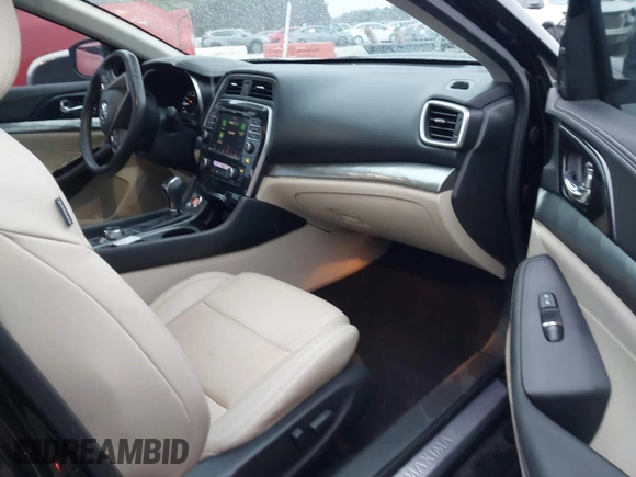 2019 Nissan Maxima Platinum z VIN 1N4AA6AV0KC379524, wystawiony jako IAAI lot #40862758 z przebiegiem 74 145 mil mil oraz . Historia ofert i sprzedaży dostępna na DreamBid. Obrazek 5.