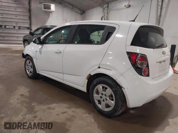 2014 Chevrolet Sonic LS with VIN 1G1JA6SG4E4208132, listed as a IAAI auction lot 38646142 with 154,013 mi miles and . Bid and sale history available at DreamBid. Image 3.