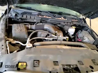 2017 Ram 1500 Laramie z VIN 1C6RR7VT0HS842840, wystawiony jako Copart lot #81412585 z przebiegiem 104 837 mil mil oraz Szkoda całkowita • Salvage title. Historia ofert i sprzedaży dostępna na DreamBid. Obrazek 13.