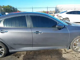 2020 Honda Civic Sedan Touring with VIN 19XFC1F97LE001901, listed as a IAAI auction lot 41048129 with 67,027 mi miles. Bid and sale history available at carsss.com. Image 13.
