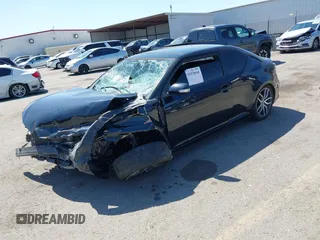 2015 Scion tC with VIN JTKJF5C77F3094936, listed as a IAAI auction lot 41830668 with 89,727 mi miles. Bid and sale history available at carsss.com. Image 18.