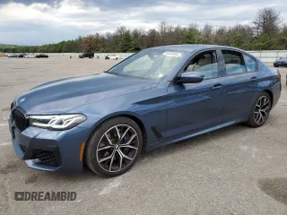2023 BMW 5 Series M550i xDrive with VIN WBA13BK06PCM31937, listed as a Copart auction lot 66490494 with 24,972 mi miles and Salvage title. Bid and sale history available at DreamBid. Image 1.