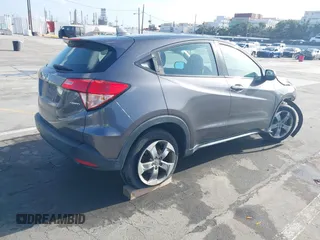 2018 Honda HR-V LX with VIN 3CZRU6H35JG719653, listed as a IAAI auction lot 41956051 with 74,307 mi miles. Bid and sale history available at carsss.com. Image 4.