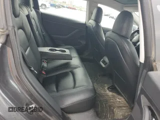 2020 Tesla Model 3 Standard Range Plus z VIN 5YJ3E1EA1LF784832, wystawiony jako Copart lot #57912995 z przebiegiem 77 665 mil mil oraz Szkoda całkowita • Salvage title. Historia ofert i sprzedaży dostępna na DreamBid. Obrazek 10.