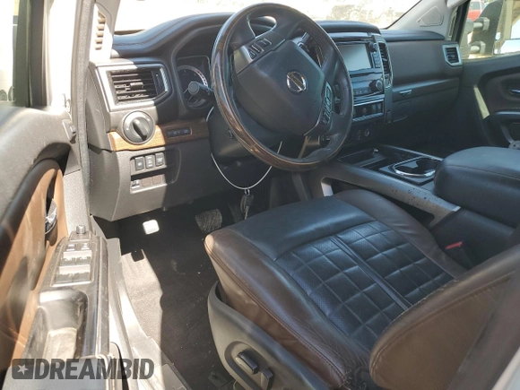 2016 Nissan Titan SL z VIN 1N6BA1F44GN514112, wystawiony jako Copart lot #48790075 z przebiegiem Nie podano mil oraz Szkoda całkowita • Salvage title. Historia ofert i sprzedaży dostępna na DreamBid. Obrazek 8.