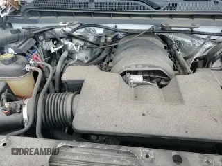 2017 Chevrolet Silverado 1500 LT z VIN 3GCUKREC2HG289800, wystawiony jako Copart lot #69928485 z przebiegiem 123 948 mil mil oraz Szkoda całkowita • Salvage title. Historia ofert i sprzedaży dostępna na DreamBid. Obrazek 13.