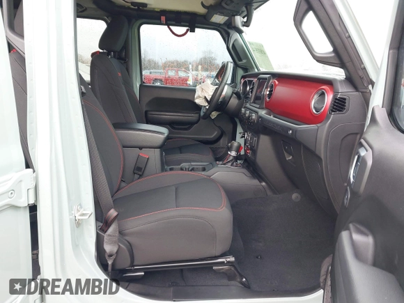 2023 Jeep Wrangler Rubicon with VIN 1C4JJXFG7PW654564, listed as a IAAI auction lot 41833534 with 22,277 mi miles and . Bid and sale history available at DreamBid. Image 5.