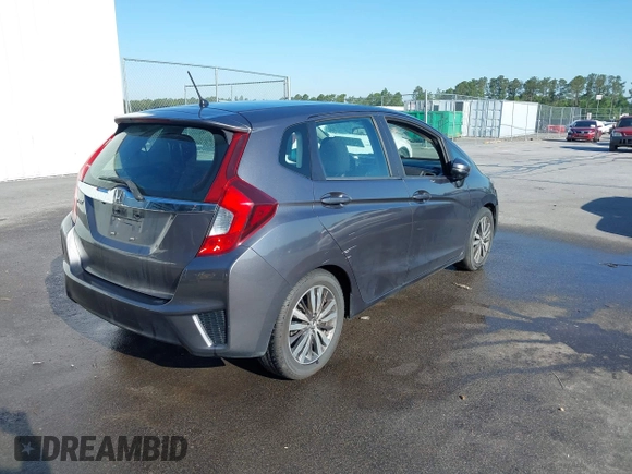 2015 Honda Fit EX-L with VIN 3HGGK5H89FM708786, listed as a IAAI auction lot 42132494 with 132,056 mi miles and . Bid and sale history available at DreamBid. Image 4.