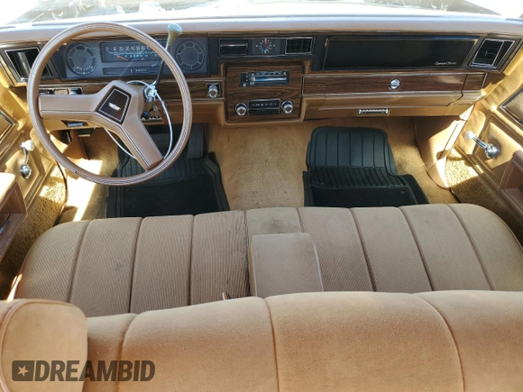 1979 Chevrolet Impala z VIN 1N69G9S303908, wystawiony jako Copart lot #70999004 z przebiegiem 47 489 mil mil oraz Szkoda całkowita • Salvage title. Historia ofert i sprzedaży dostępna na DreamBid. Obrazek 8.