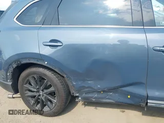 2021 Mazda CX-9 Carbon Edition z VIN JM3TCBDY0M0526352, wystawiony jako IAAI lot #42403901 z przebiegiem 50 193 mil mil oraz . Historia ofert i sprzedaży dostępna na DreamBid. Obrazek 6.