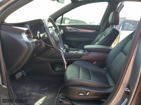 2023 Cadillac XT6 FWD Luxury with VIN 1GYKPAR47PZ113833, listed as a Copart auction lot 49066235 with 25,794 mi miles and Salvage Title. Bid and sale history available at carsss.com. Image 7.