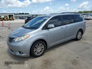 2011 Toyota Sienna XLE AAS with VIN 5TDYK3DC2BS011343, listed as a Copart auction lot 61223675 with 187,206 mi miles and Salvage title. Bid and sale history available at DreamBid. Image 1.
