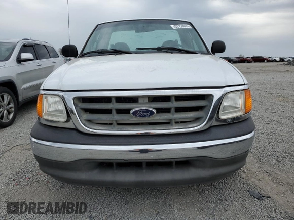 2004 Ford F-150 XL with VIN 2FTRF17234CA32622, listed as a Copart auction lot 53158095 with 217,728 mi miles and Salvage title. Bid and sale history available at DreamBid. Image 5.