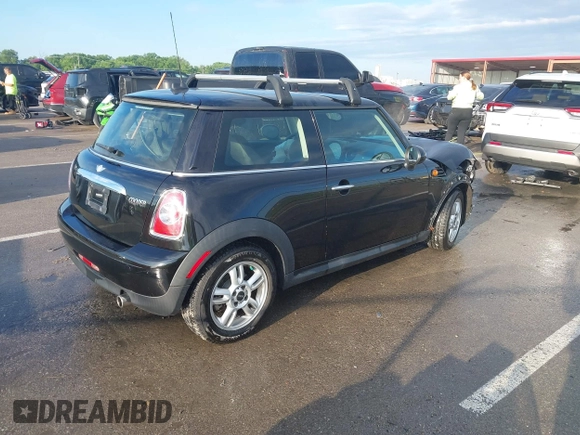 2012 MINI Hardtop with VIN WMWSU3C50CT185690, listed as a IAAI auction lot 42367571 with 63,303 mi miles and . Bid and sale history available at DreamBid. Image 4.