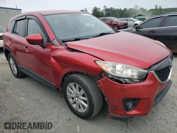 2014 Mazda CX-5 Touring z VIN JM3KE4CY3E0382106, wystawiony jako Copart lot #55521645 z przebiegiem 84 539 mil mil oraz Szkoda całkowita • Salvage title. Historia ofert i sprzedaży dostępna na DreamBid. Obrazek 4.