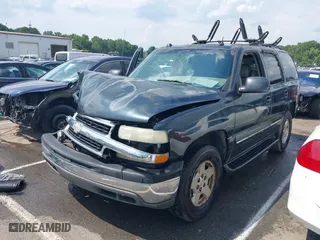 2004 Chevrolet Tahoe LT with VIN 1GNEC13Z04J134981, listed as a IAAI auction lot 39886652 with 244,056 mi miles. Bid and sale history available at carsss.com. Image 18.