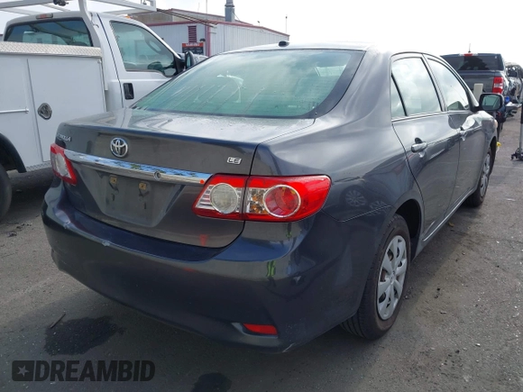 2011 Toyota Corolla L with VIN JTDBU4EE7B9162022, listed as a IAAI auction lot 42066643 with 124,384 mi miles. Bid and sale history available at carsss.com. Image 4.