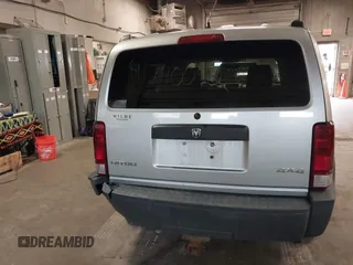 2007 Dodge Nitro SXT with VIN 1D8GU28K47W569317, listed as a IAAI auction lot 41740052 with 220,265 mi miles. Bid and sale history available at carsss.com. Image 16.