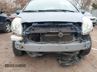 2009 Toyota Yaris with VIN JTDKT903195255240, listed as a IAAI auction lot 41650800 with 168,991 mi miles. Bid and sale history available at carsss.com. Image 6.