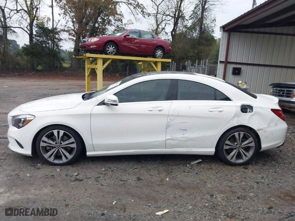 2019 Mercedes-Benz CLA with VIN WDDSJ4EB7KN705025, listed as a IAAI auction lot 40894750 with 76,000 mi miles. Bid and sale history available at carsss.com. Image 15.
