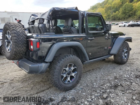 2023 Jeep Wrangler Rubicon with VIN 1C4HJXCGXPW545938, listed as a Copart auction lot 73939634 with 13,590 mi miles and Salvage title. Bid and sale history available at DreamBid. Image 3.