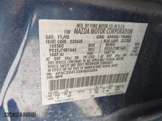 2003 Mazda Tribute LX with VIN 4F2CZ04133KM23234, listed as a IAAI auction lot 41869955 with 240,898 mi miles. Bid and sale history available at carsss.com. Image 9.