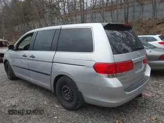 2010 Honda Odyssey LX with VIN 5FNRL3H26AB008709, listed as a IAAI auction lot 41836230 with 168,267 mi miles and . Bid and sale history available at DreamBid. Image 3.