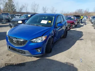 2013 Mazda CX-5 Grand Touring with VIN JM3KE4DE1D0147934, listed as a IAAI auction lot 41869973 with 164,345 mi miles. Bid and sale history available at carsss.com. Image 2.