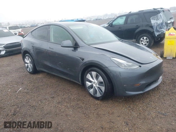 2023 Tesla Model Y Long Range with VIN 7SAYGDEE7PF894362, listed as a IAAI auction lot 41512492 with 27,513 mi miles. Bid and sale history available at carsss.com. Image 1.